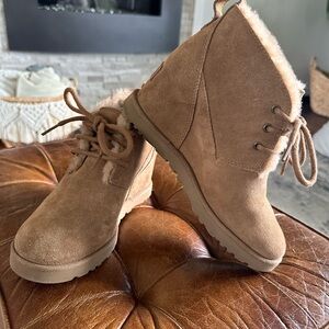 Size 5.5 women’s Ugg wedge heal boots.